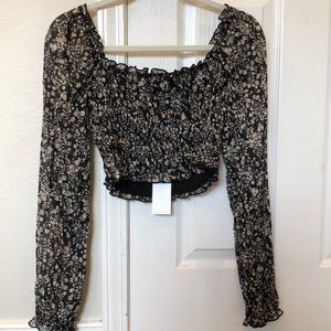 Beautiful and delicate ruched top with floral and silver details. #socialite